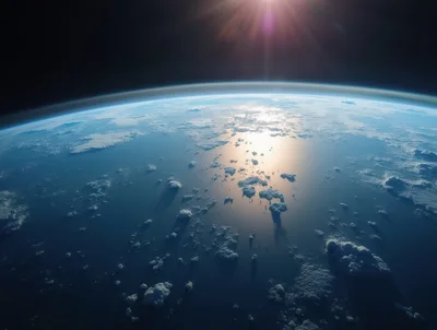 Earth Horizon View From Space With Sun Glint