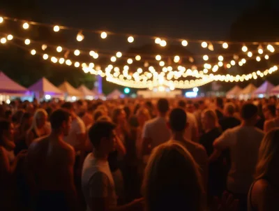 Crowd Enjoying Outdoor Music Festival at Night