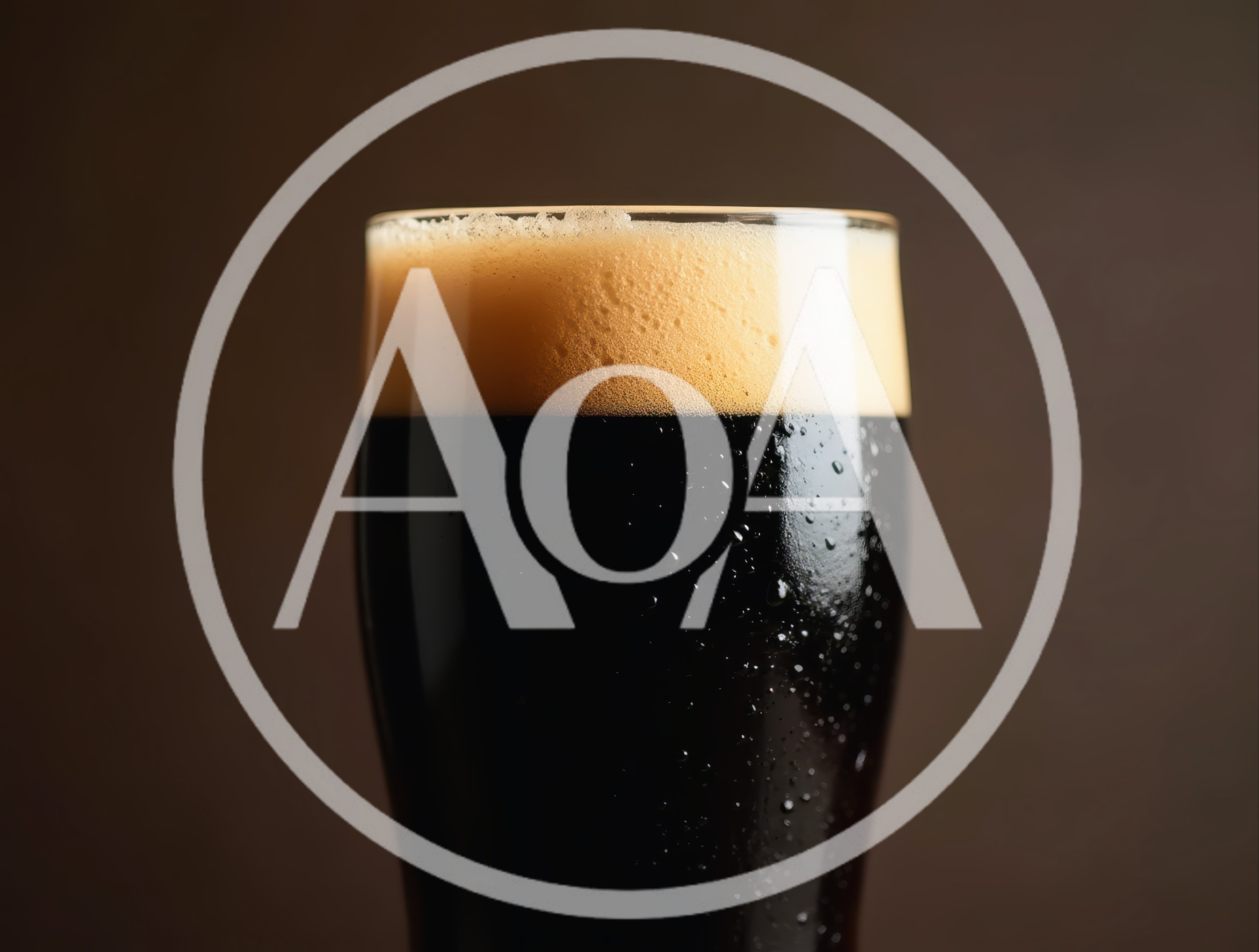 Glass Of Dark Stout Beer With Creamy Foam