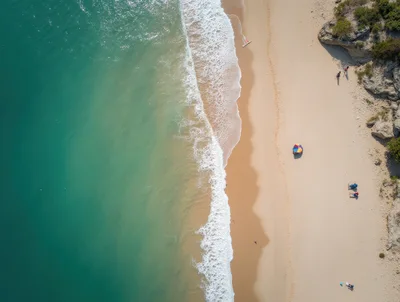 Aerial View Of A Sandy Beach With Turquoise Water
