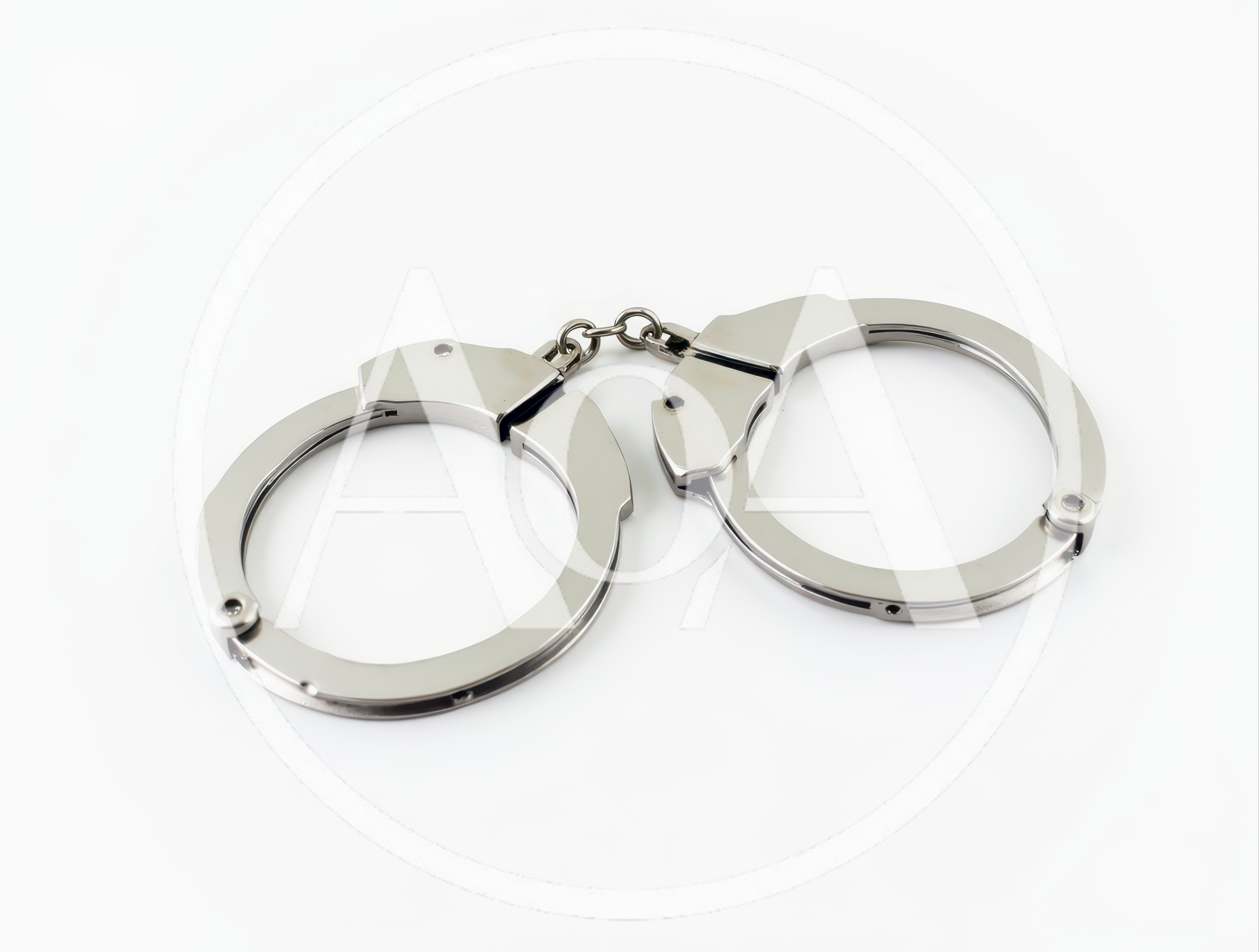 Silver Metal Handcuffs Isolated on White Background