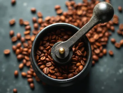 Manual Coffee Grinder Filled With Roasted Coffee Beans