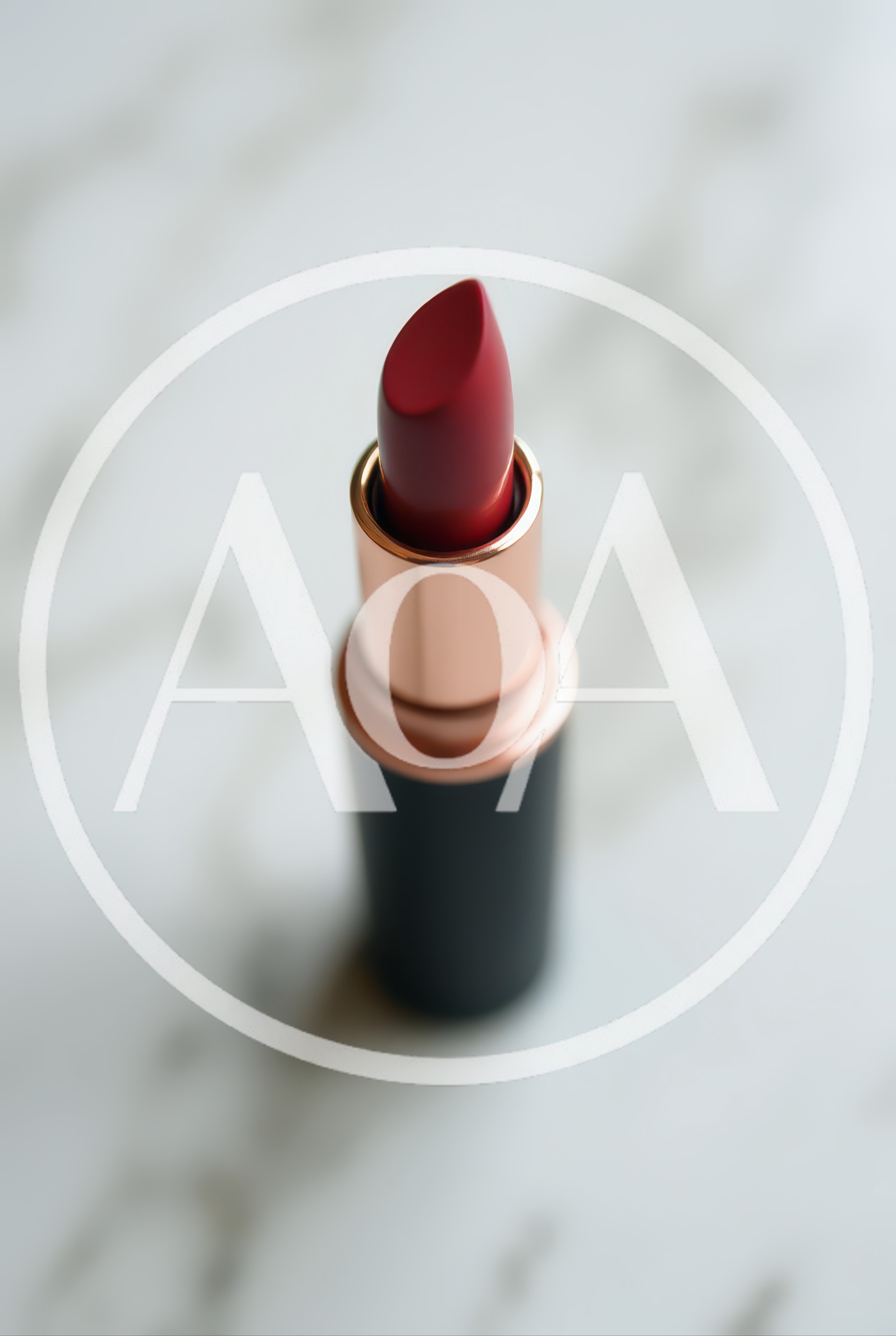 Red Lipstick Tube Standing On White Marble Surface