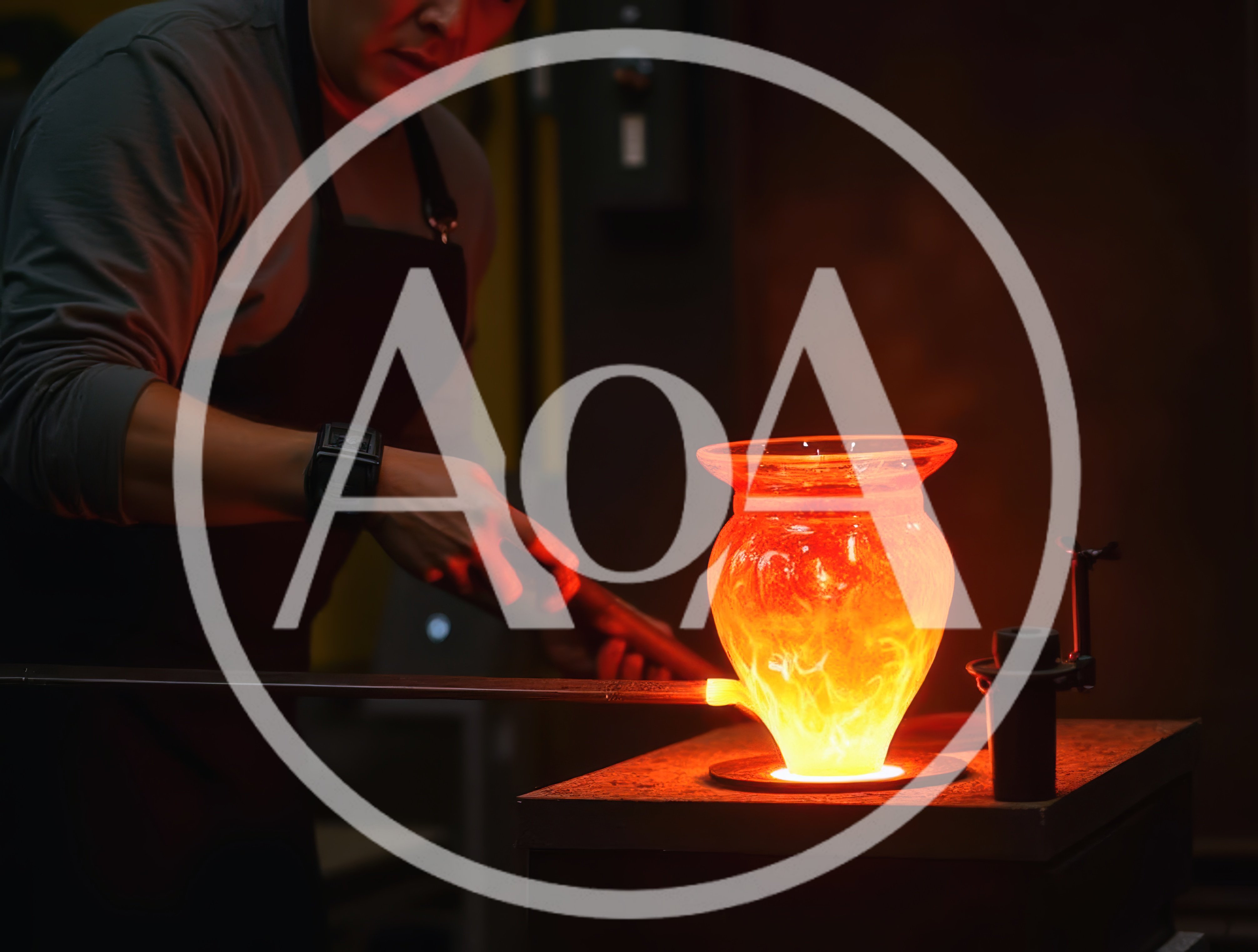 Glassblower Shaping Molten Glass Vase In Workshop