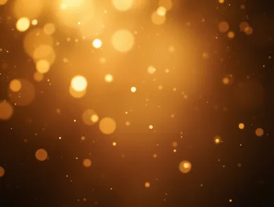 Golden Bokeh Particles Floating On Dark Background