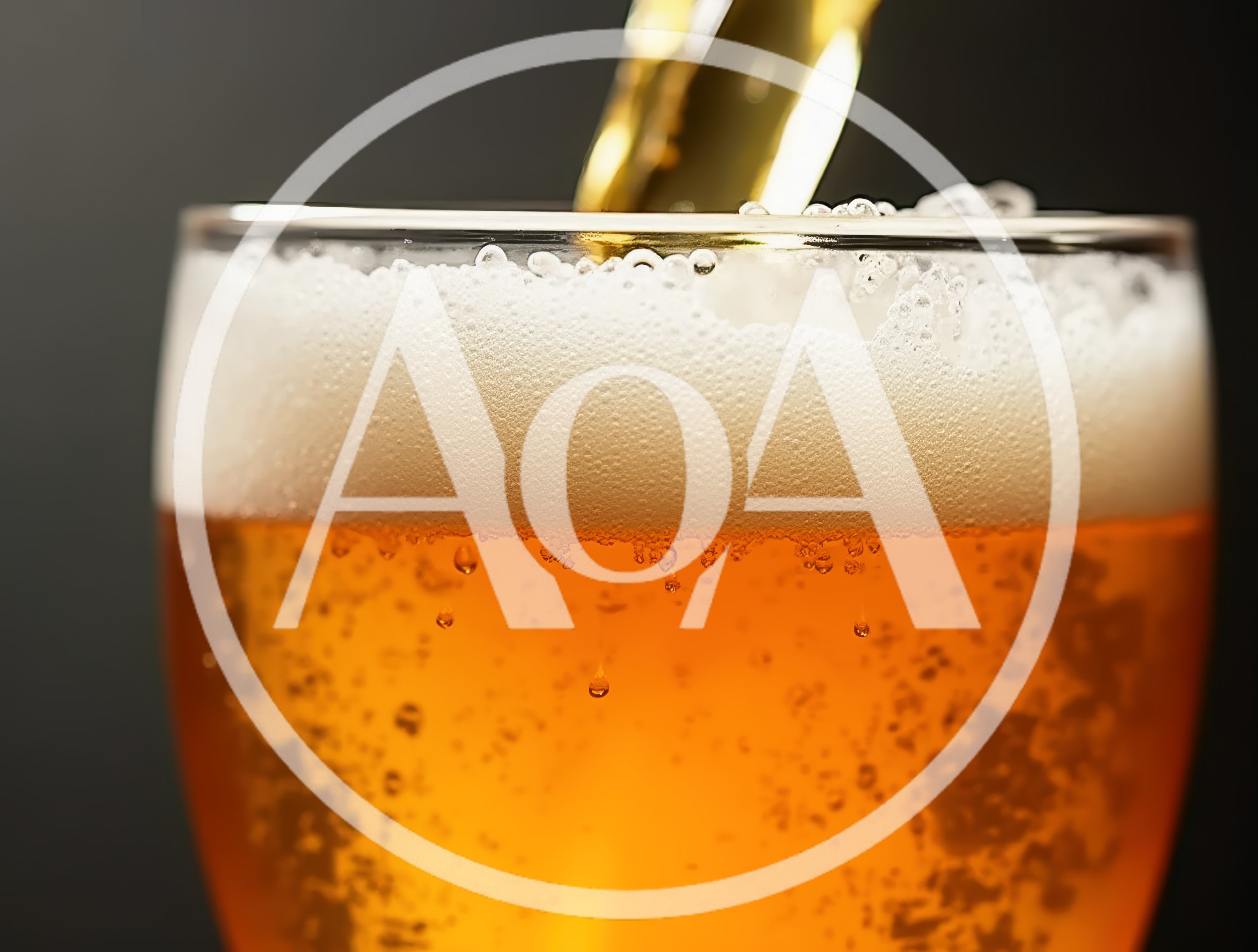 Golden Beer Pouring Into A Glass
