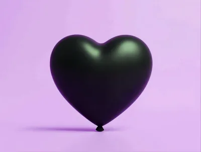 Black Heart Shaped Balloon On Purple Background