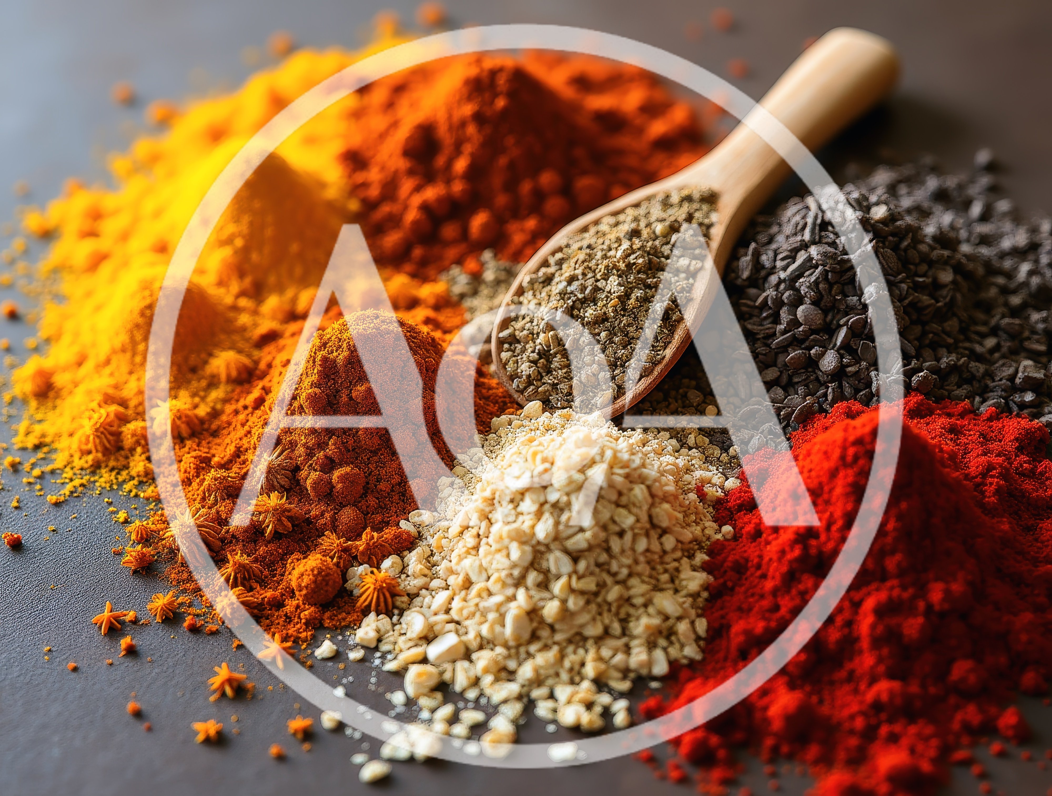 Assorted Colorful Spices Piled on Dark Surface
