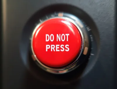 Red Do Not Press Button Close Up