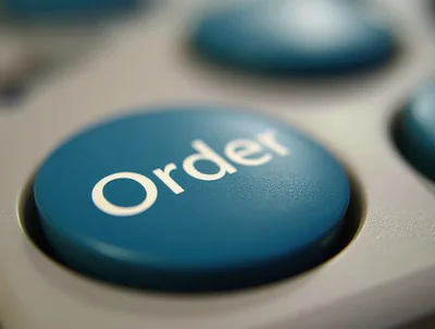 Close Up Of A Blue Order Button