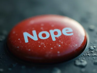 Red Nope Button With Water Droplets On Dark Surface