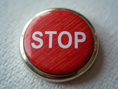 Red Stop Button With Metallic Rim