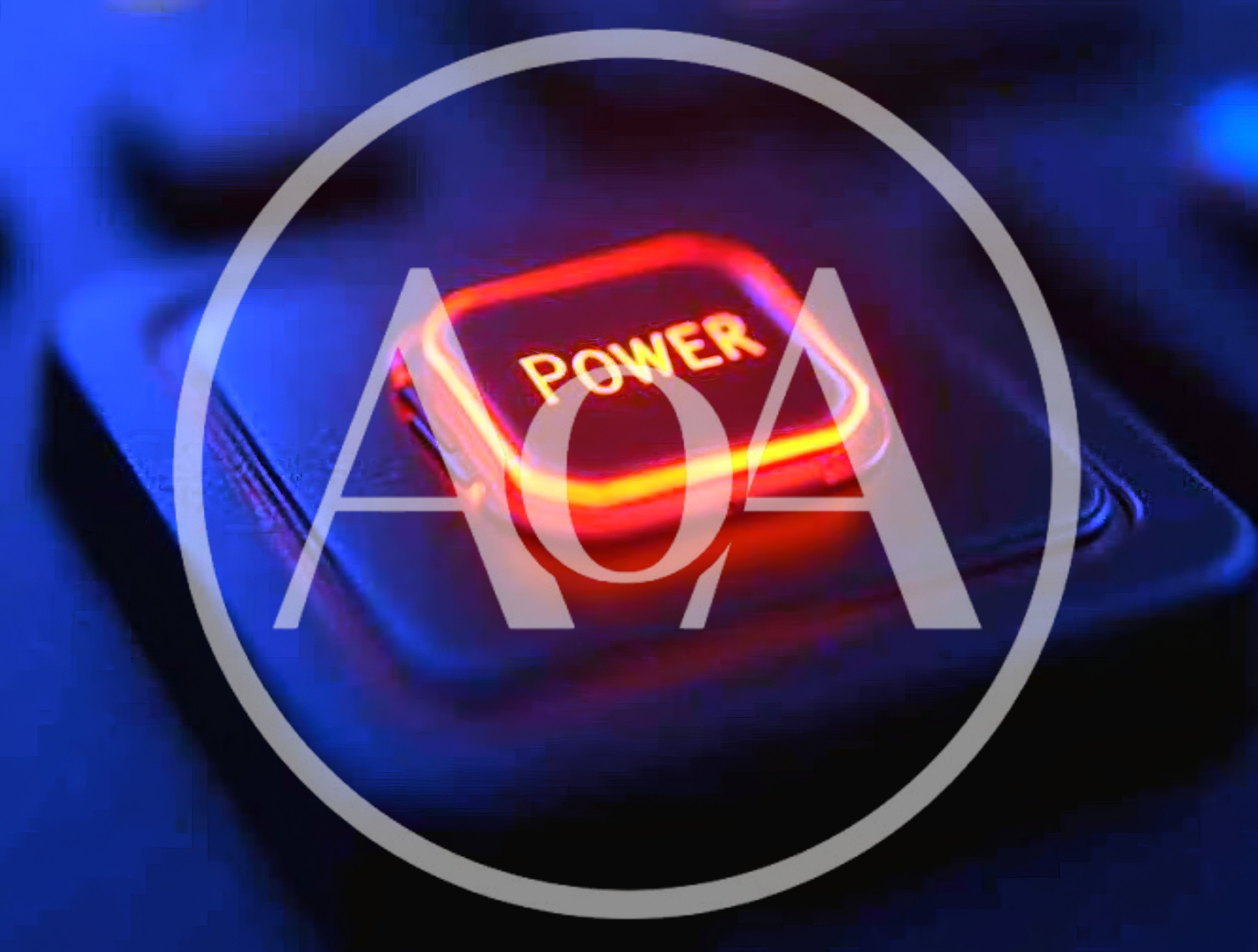 Glowing Red Power Button On A Dark Keyboard