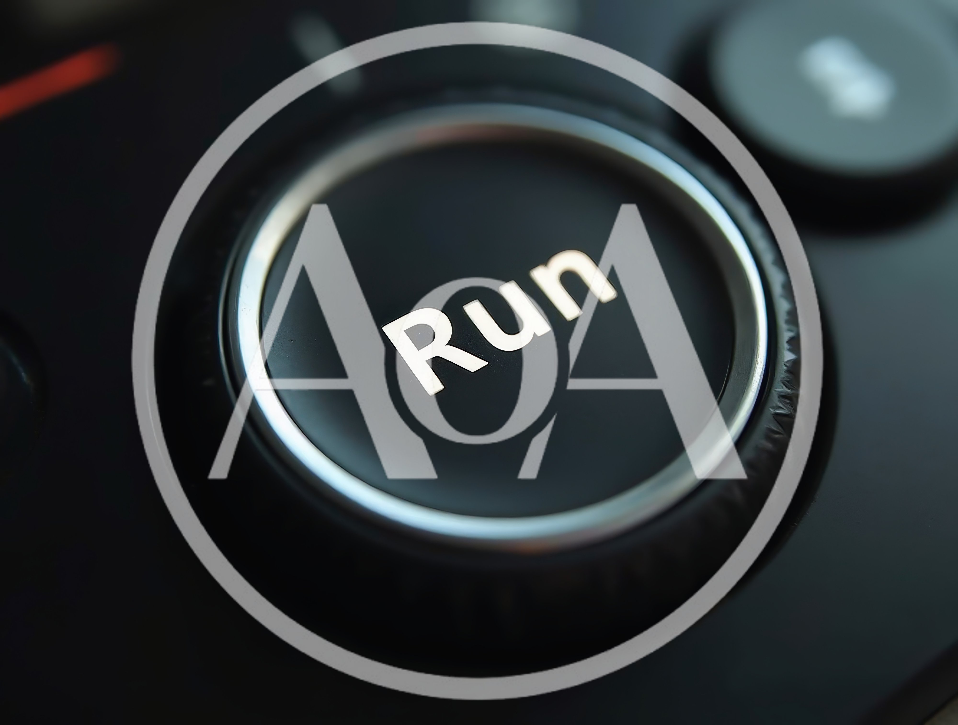 Close Up Of A Black Run Button