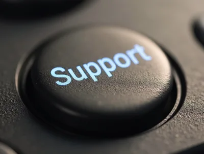 Close Up Of A Glowing Support Button