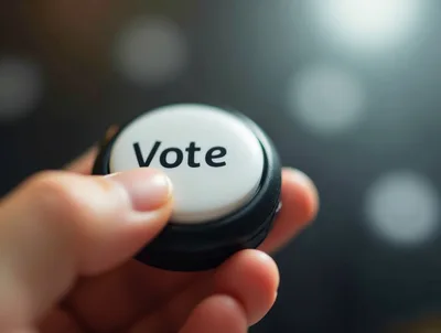 Hand Pressing A White Vote Button