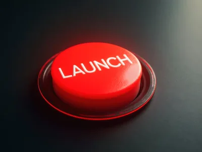Red Launch Button on Dark Surface