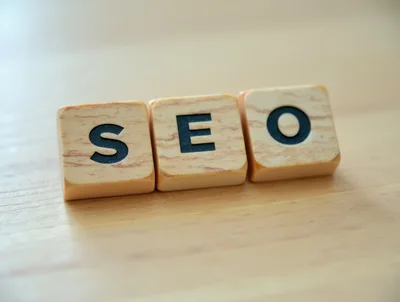 Wooden Letter Tiles Spelling SEO on Wooden Surface