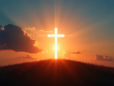 Glowing Christian Cross Silhouette Against A Sunset Sky