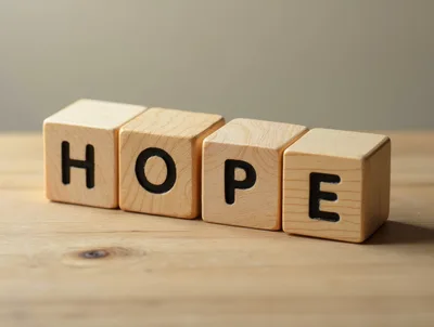 Wooden Blocks Spelling The Word Hope