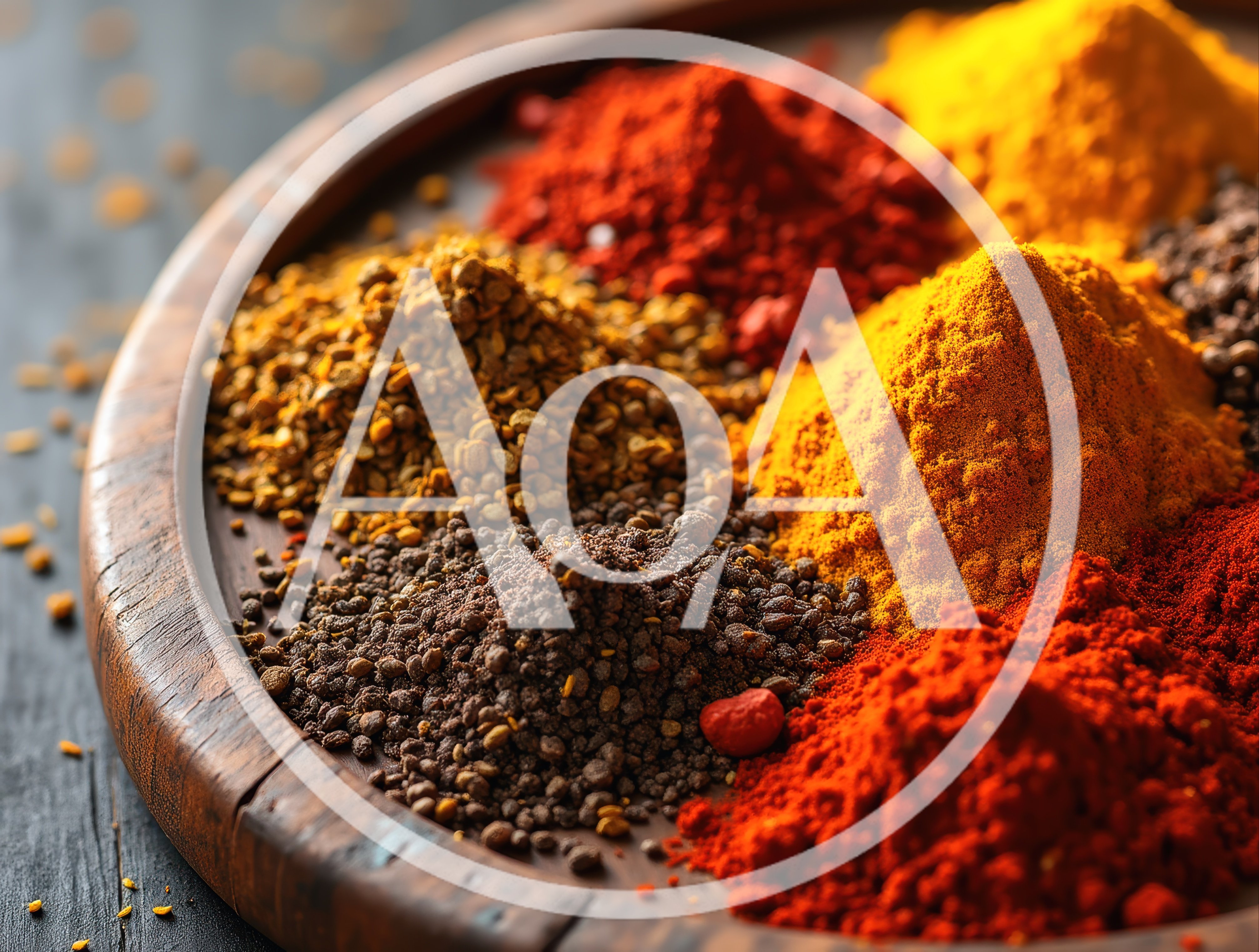 Assorted Colorful Spices Arranged On A Wooden Tray