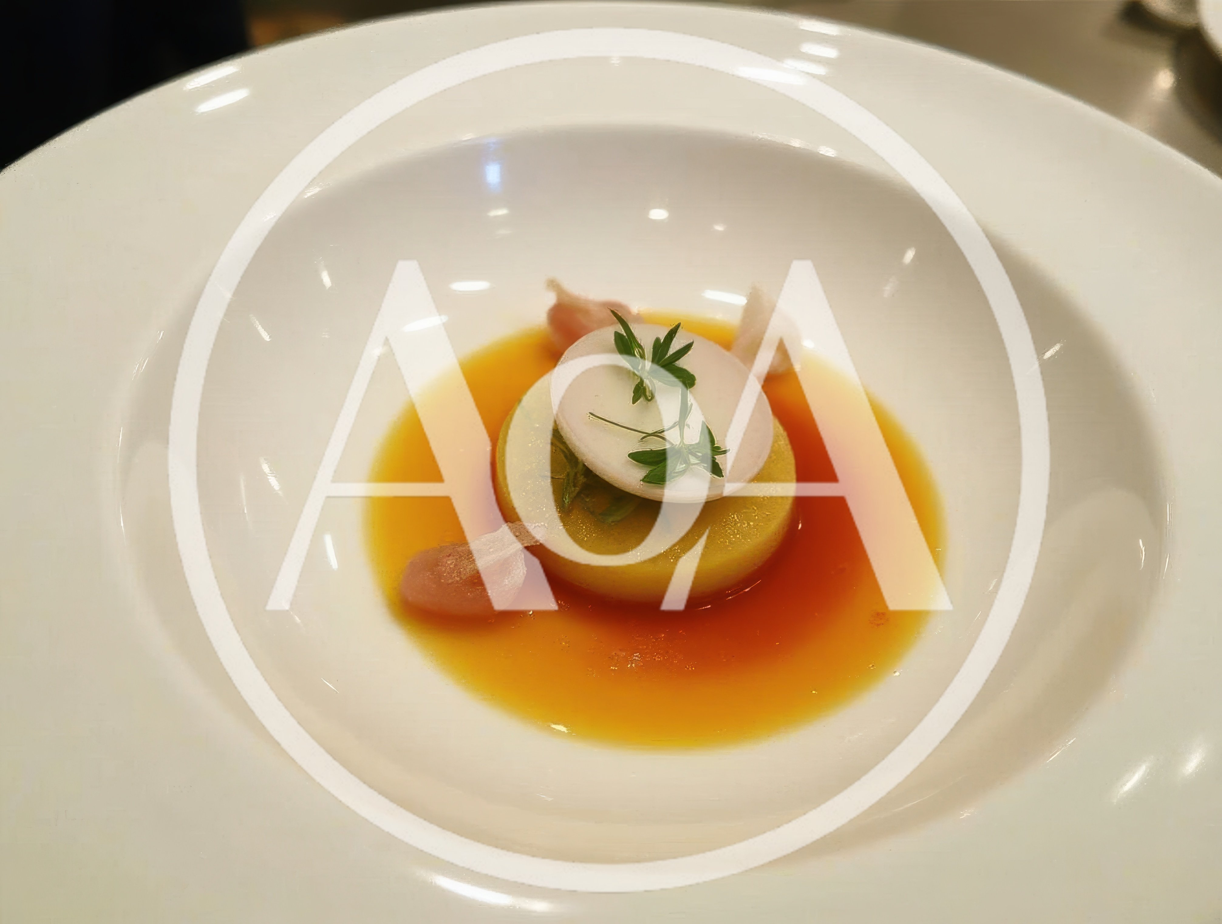 Gourmet Plated Vegetable Dish In A White Bowl