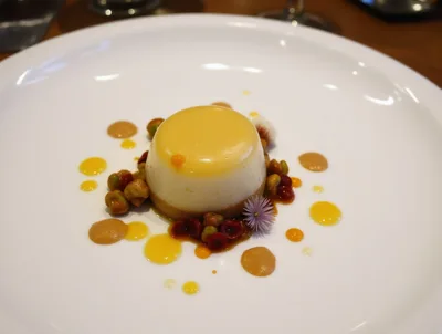 Gourmet Panna Cotta Dessert Plated On White Plate