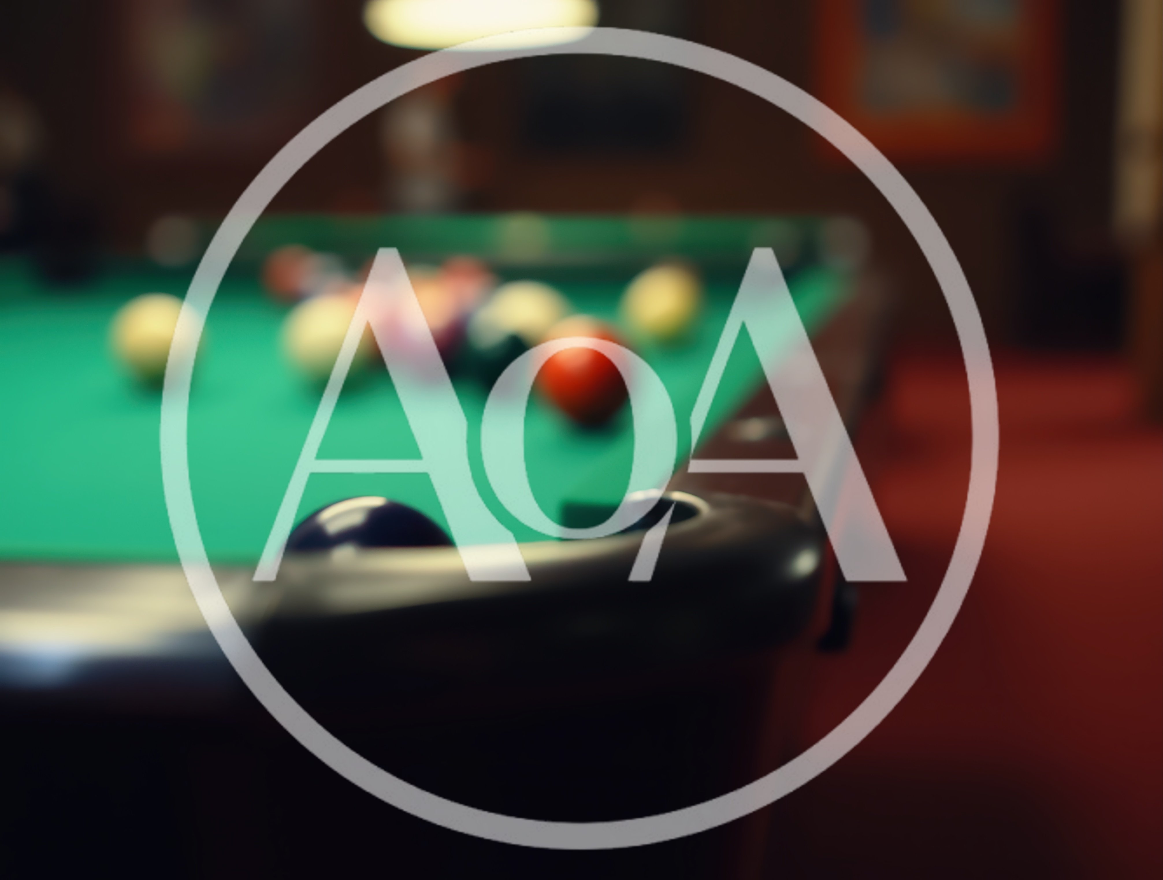 Billiard Table With Colorful Balls In A Dimly Lit Room