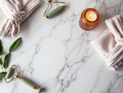 Spa Wellness Flat Lay with Jade Rollers and Candle