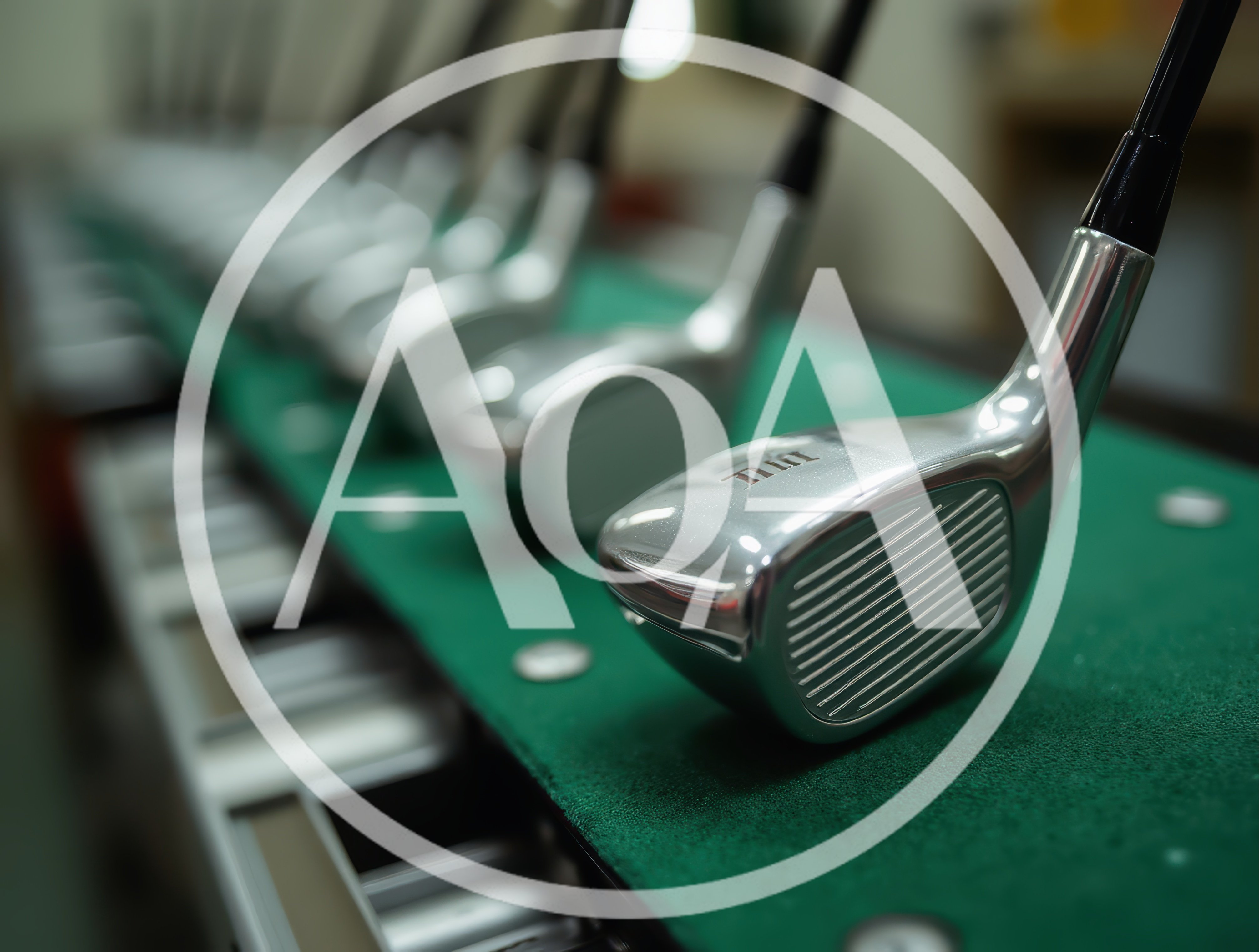 Row Of Shiny Golf Irons On A Putting Green