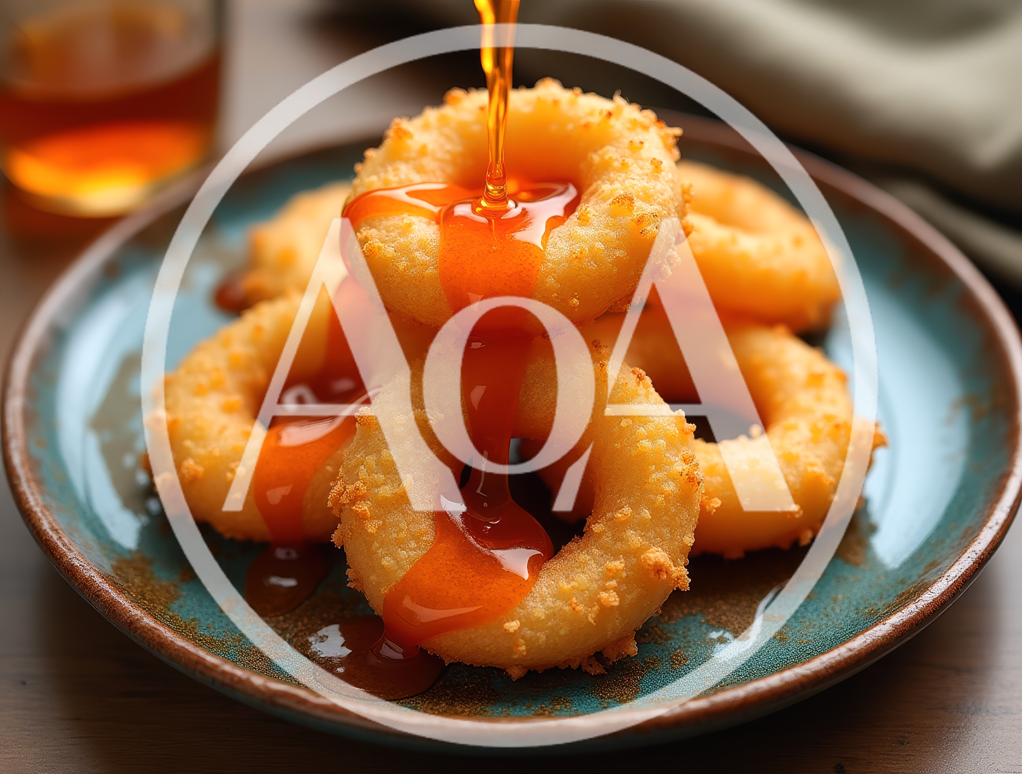 Golden Fried Onion Rings Drizzled With Sweet Syrup
