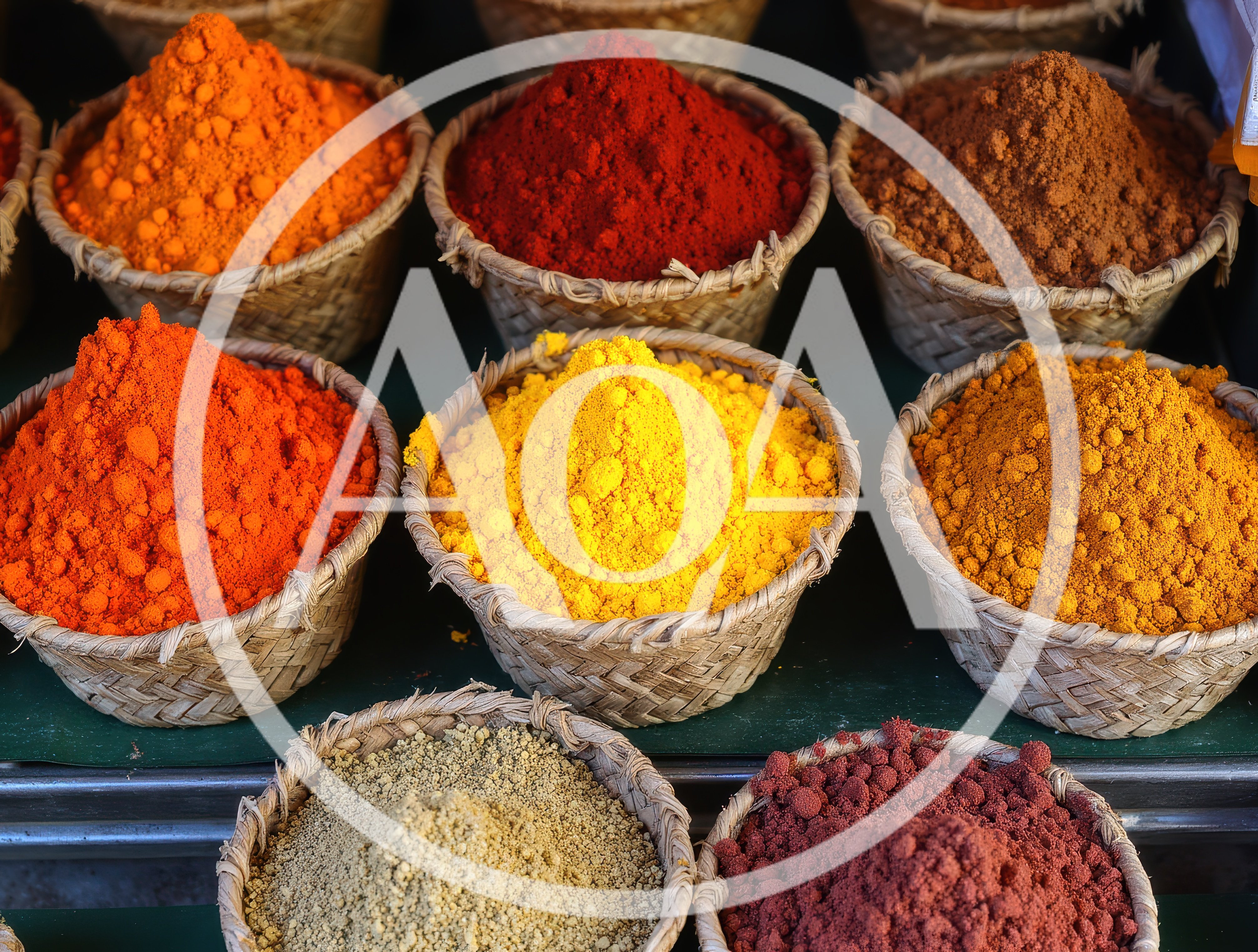 Colorful Spices Displayed In Woven Baskets