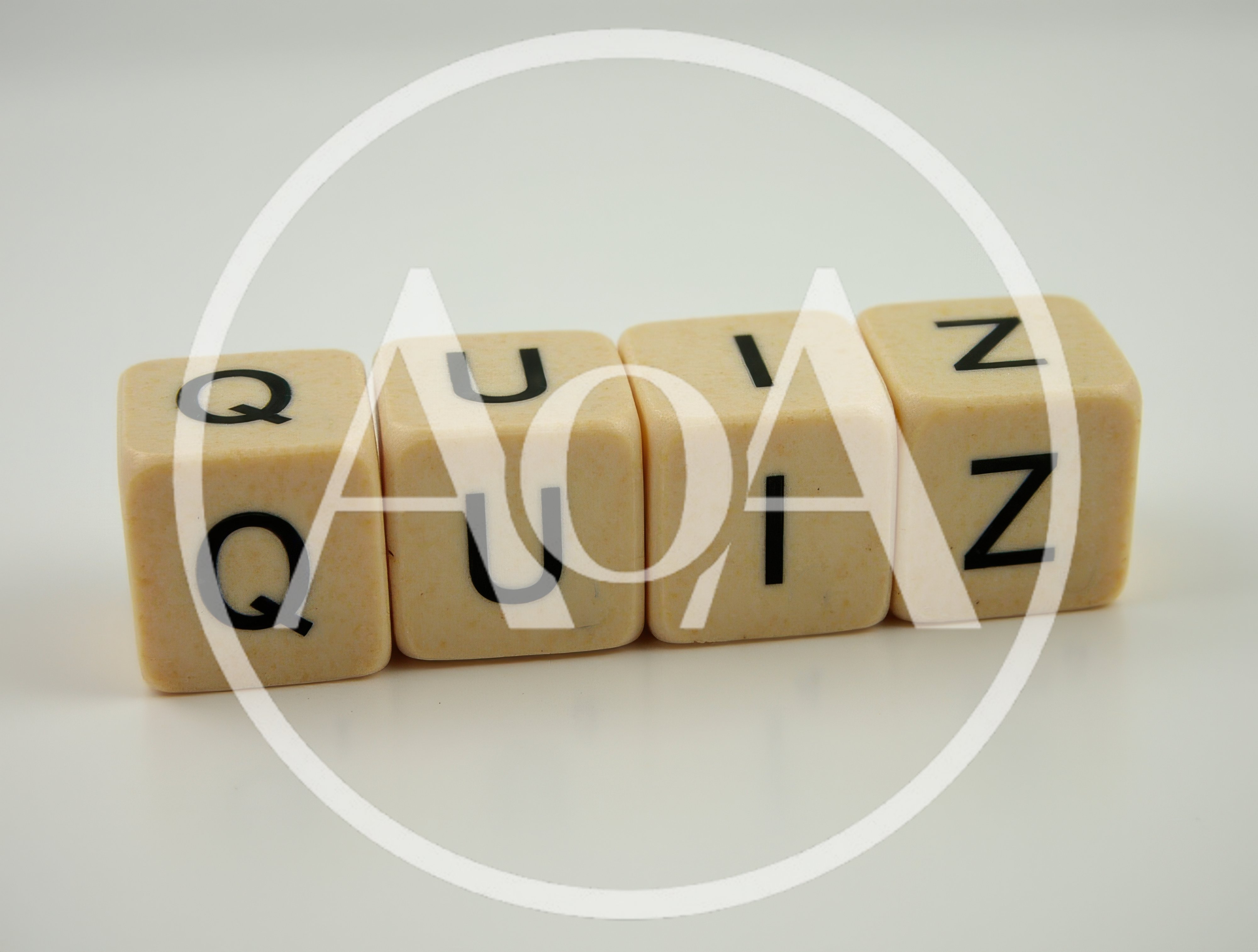 Four Beige Dice Spelling The Word Quiz