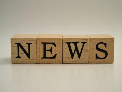 Wooden Blocks Spelling The Word News