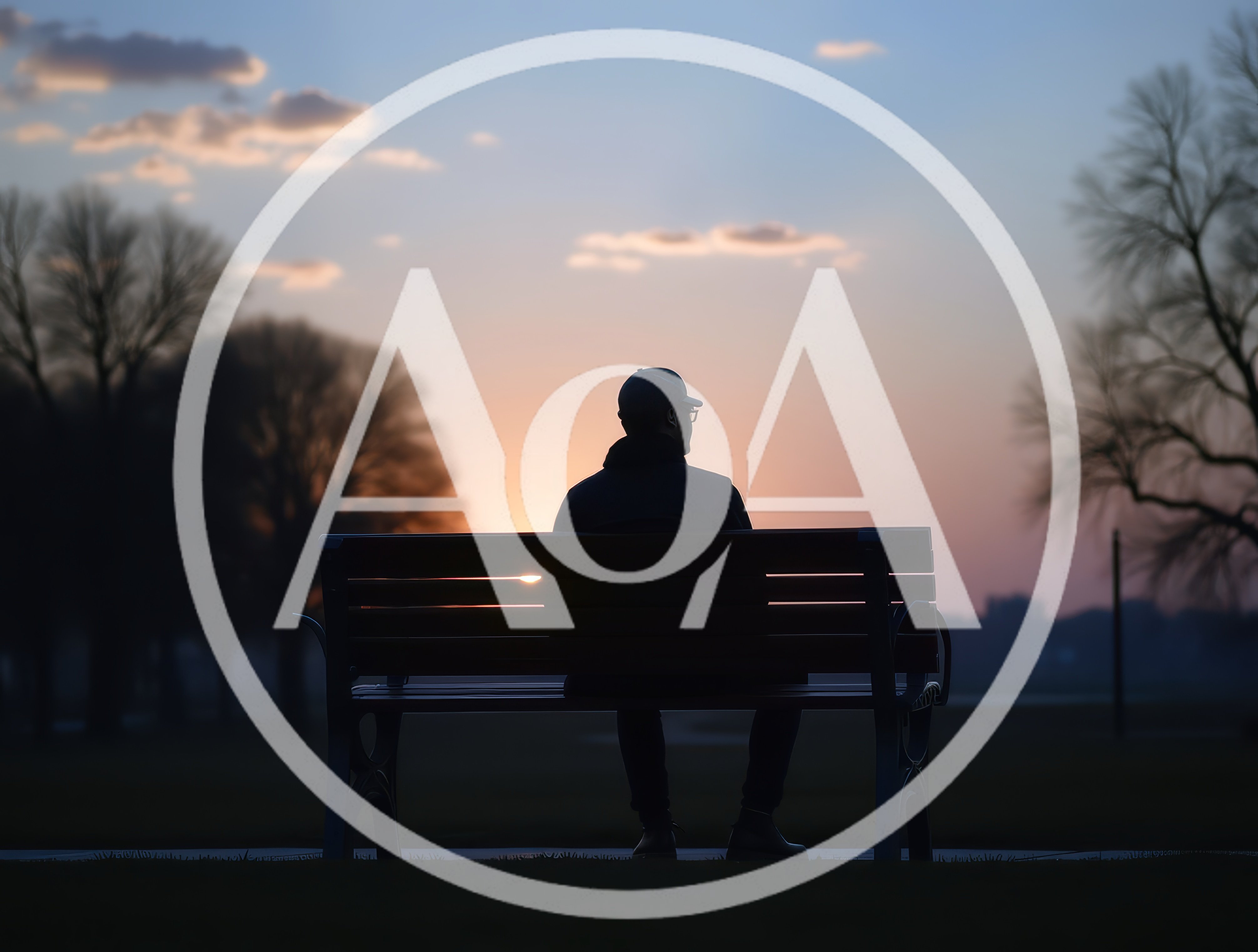 Silhouette Of A Man Sitting On A Park Bench