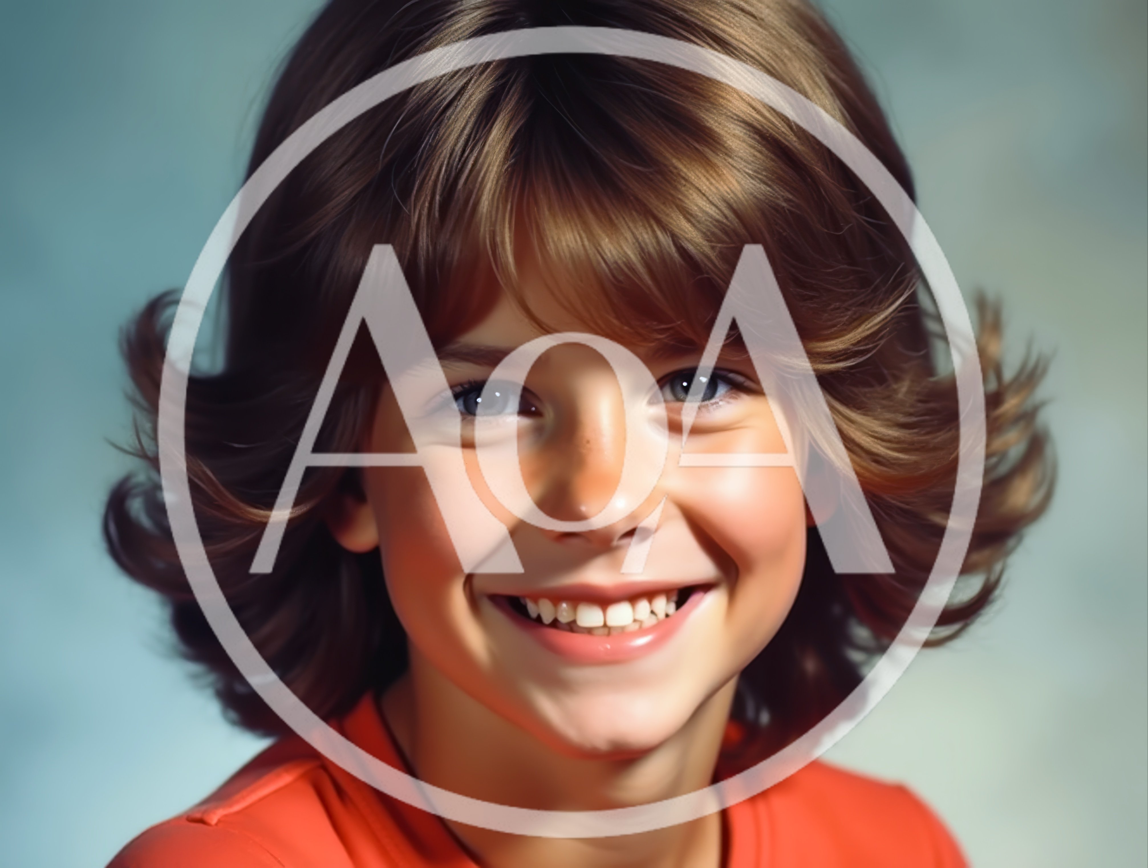 Portrait Of A Smiling Young Child With Brown Hair
