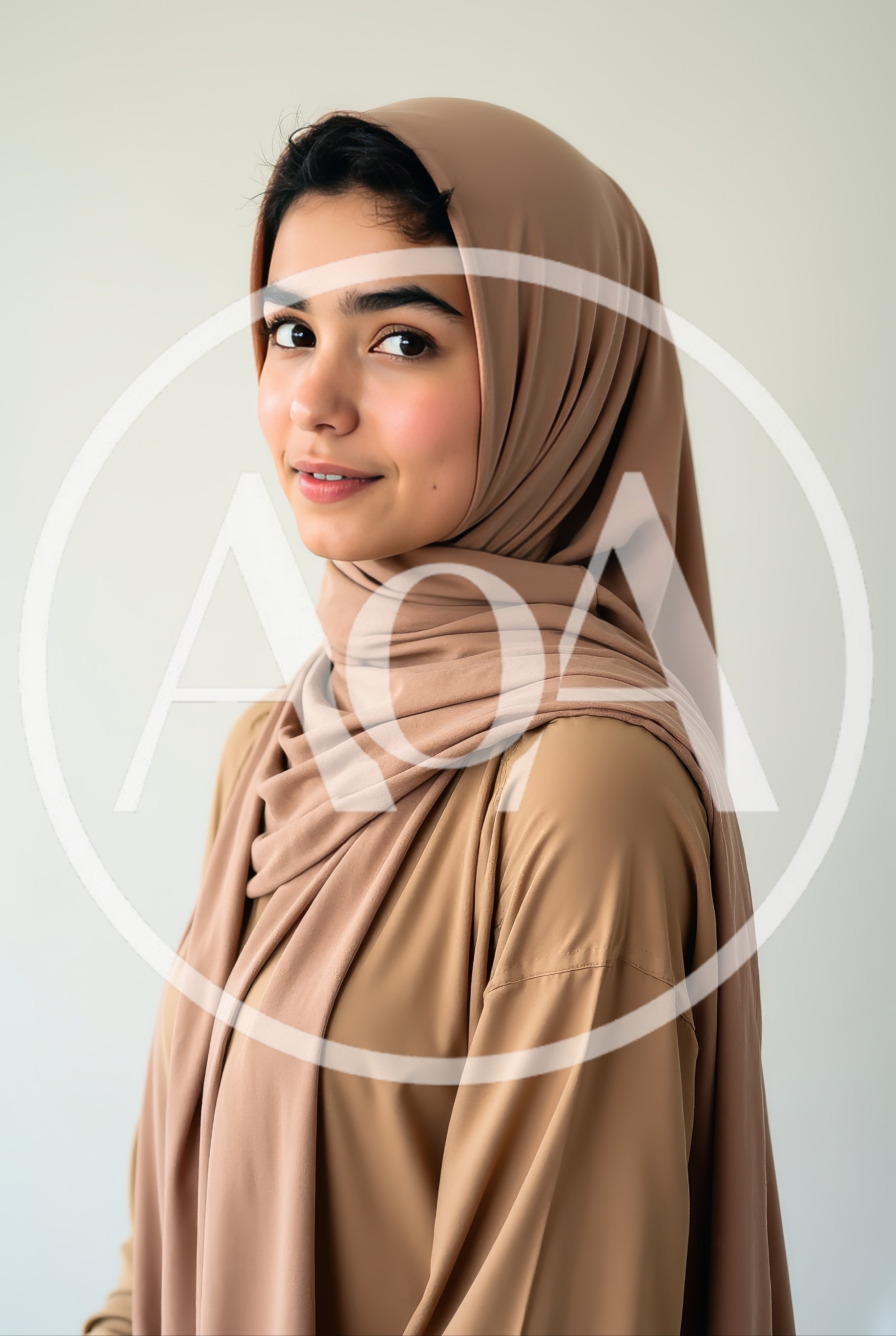 Portrait Of A Young Woman Wearing A Beige Hijab