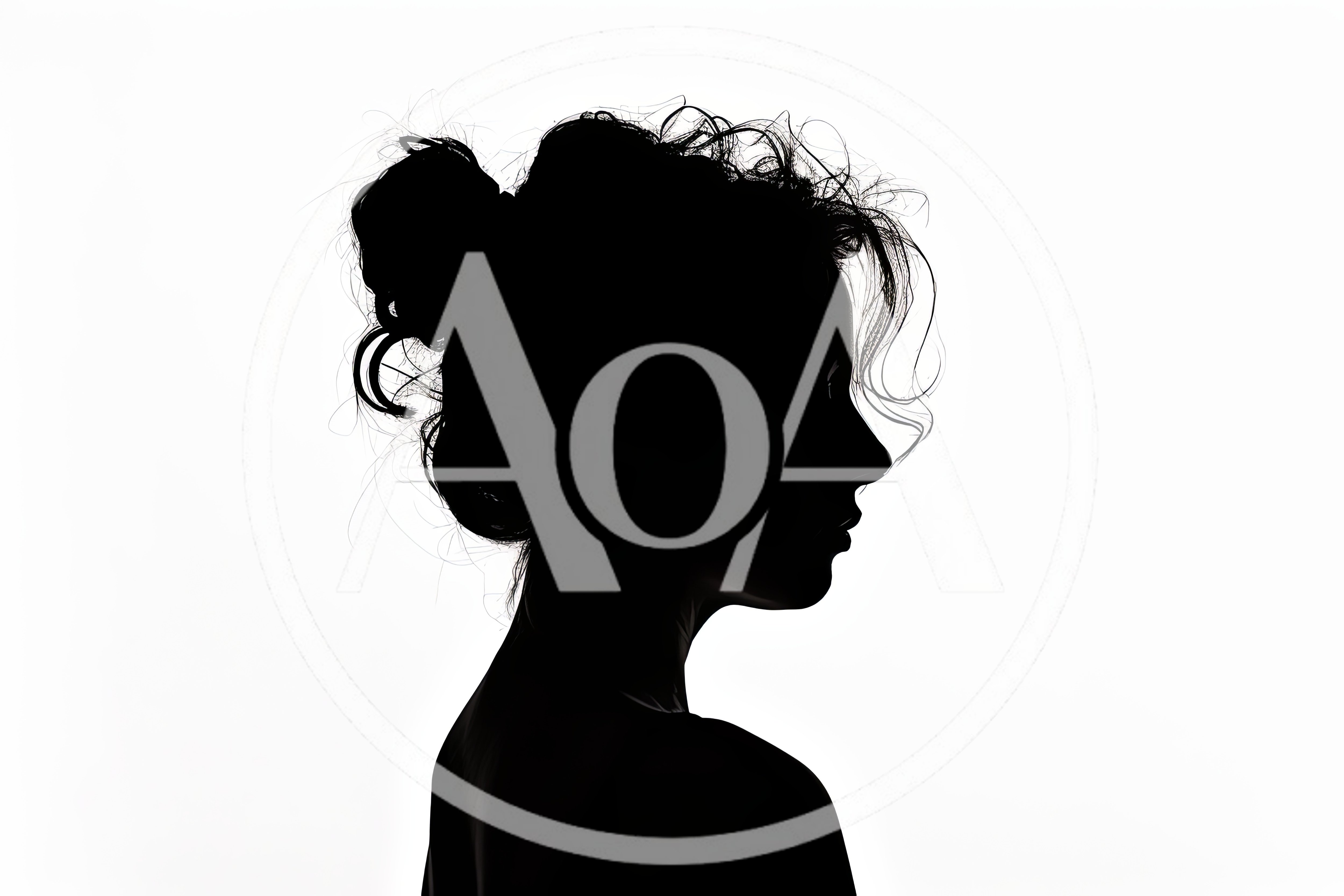 Silhouette Of A Woman With Messy Bun Hairstyle