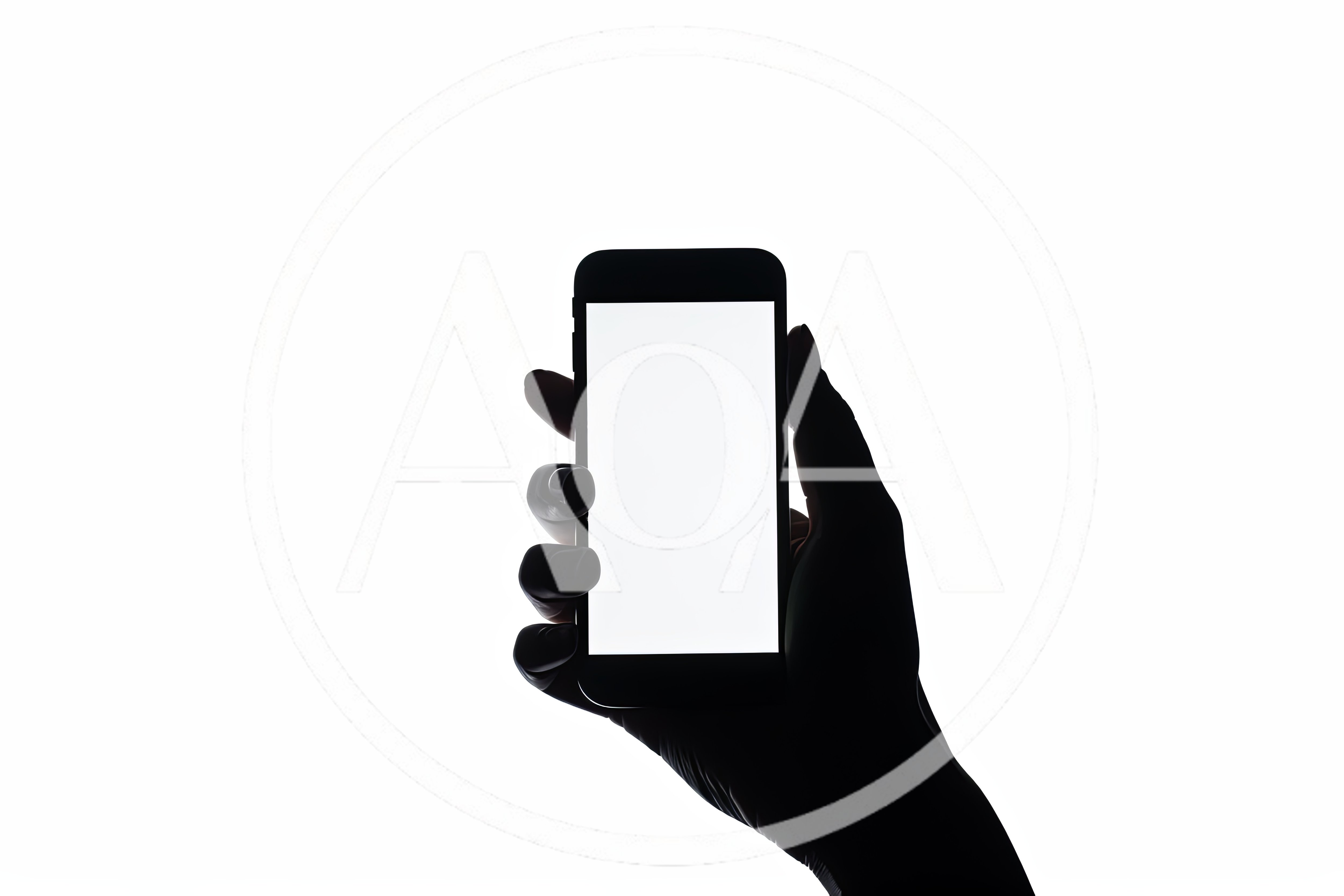 Silhouette Of A Hand Holding A Smartphone