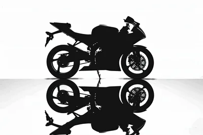 Silhouette Of A Sportbike On A Reflective Surface