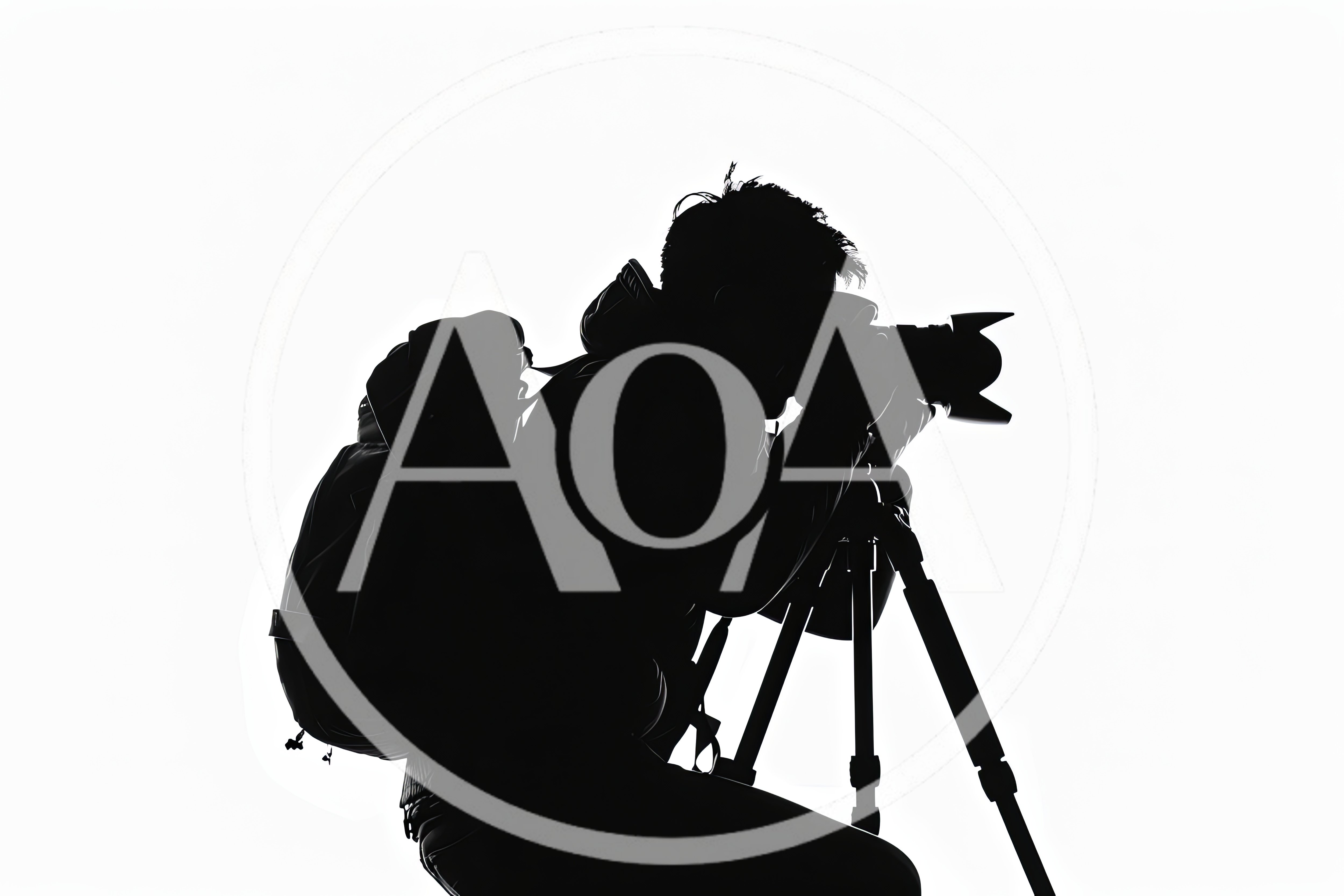 Silhouette Of A Photographer Using A Tripod