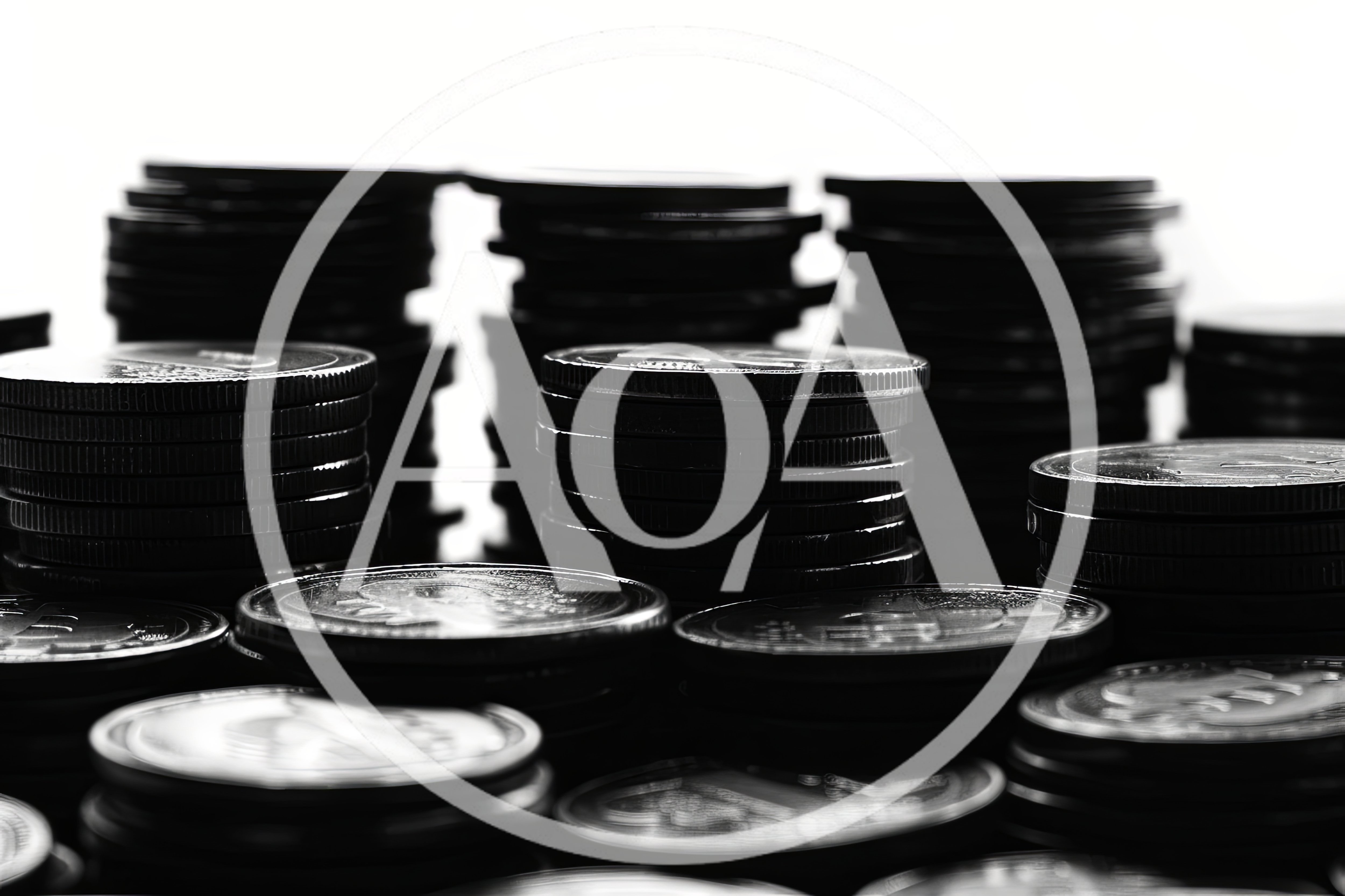 Stacks Of Metallic Coins In Monochrome