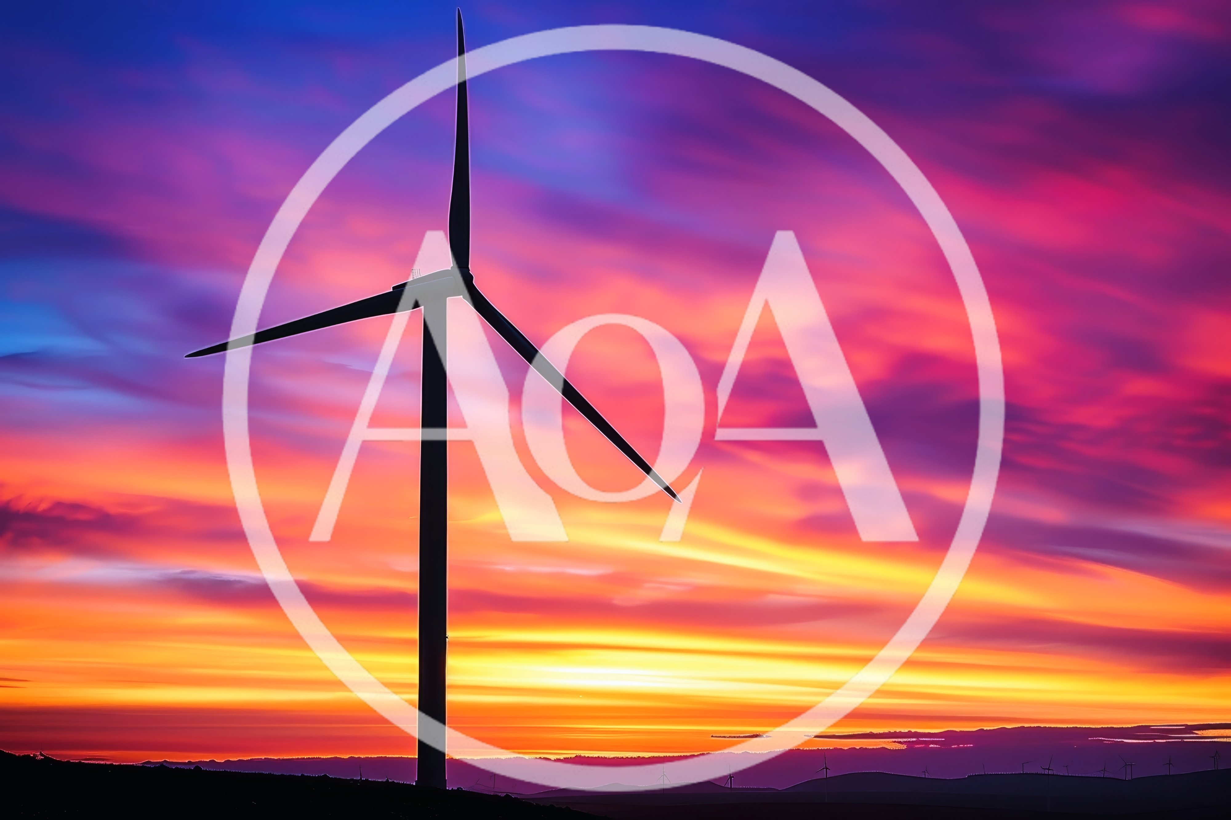 Wind Turbine Silhouette Against A Vibrant Sunset Sky