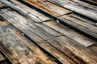 Weathered Wooden Planks On A Rustic Boardwalk