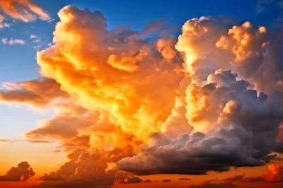 Dramatic Golden Hour Cumulus Clouds At Sunset