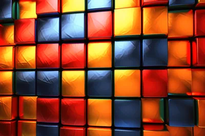 Abstract Background Of Glowing Colorful Metallic Cubes
