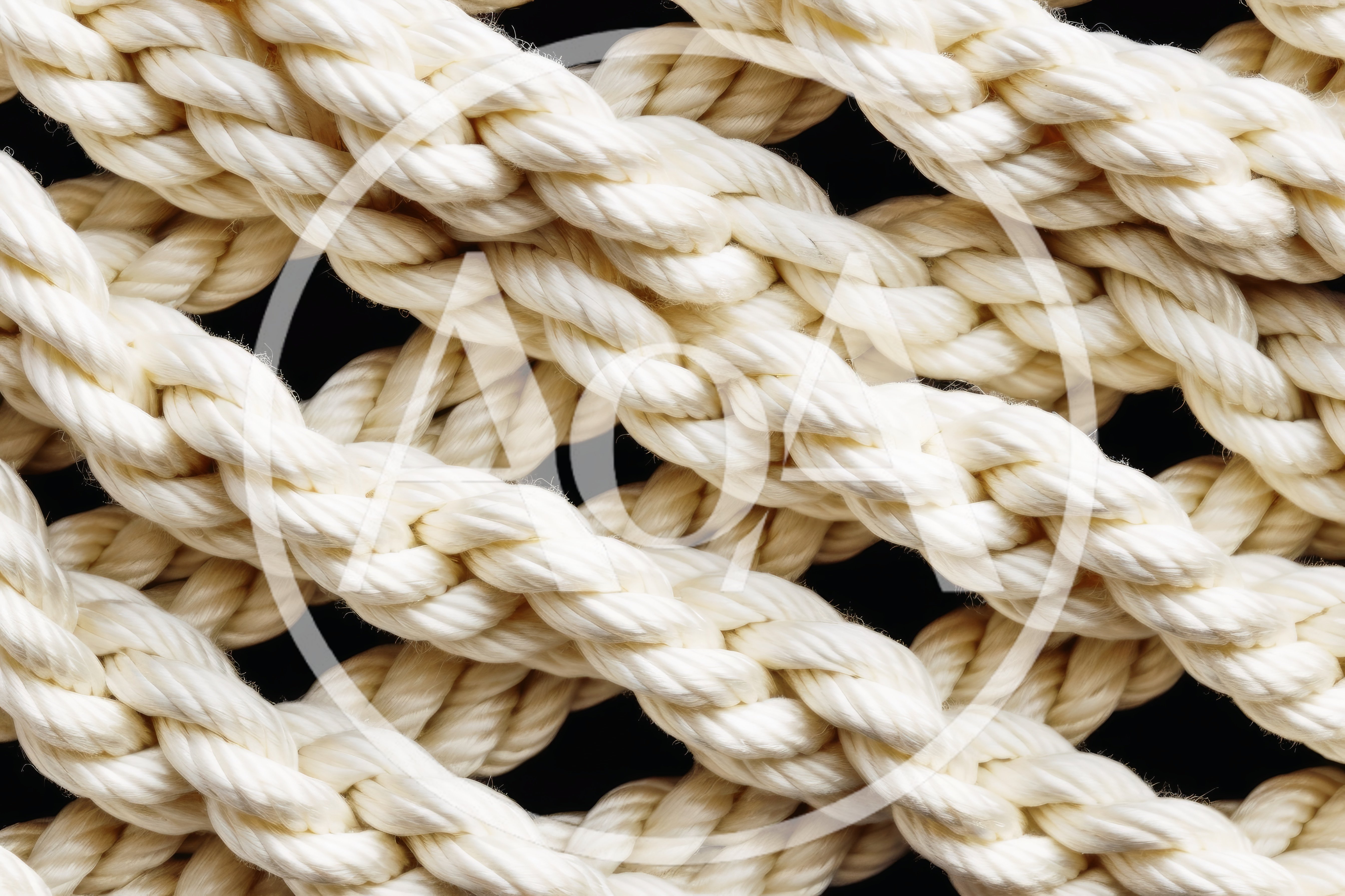 Close Up Of Interwoven White Synthetic Rope