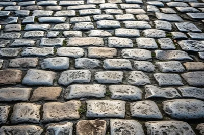 Close Up View Of Traditional Cobblestone Street Pavement