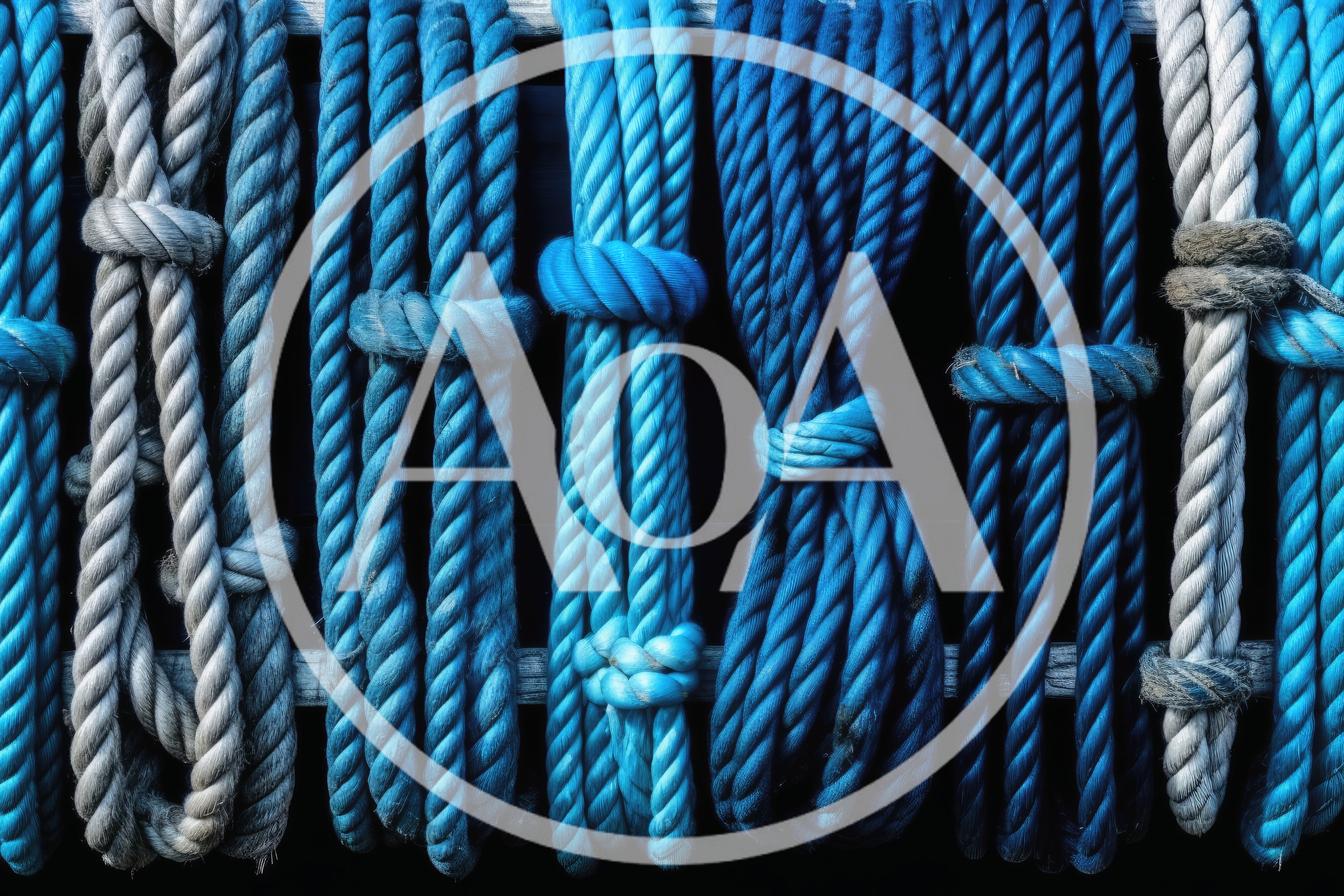 Hanging Nautical Ropes With Knots On Wooden Rack