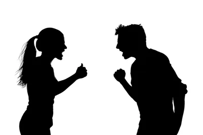 Silhouettes Of A Man And Woman Arguing